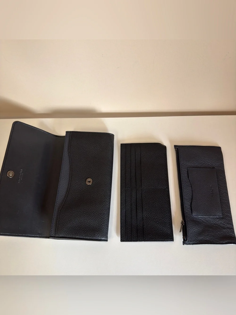 Coach sleek black